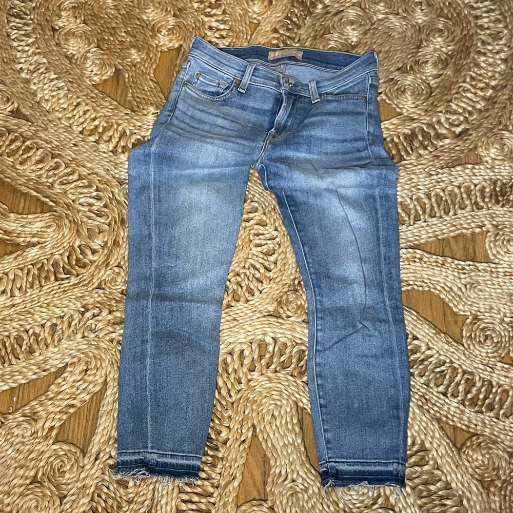 7 for All Man Kind light blue denim with raw cropped leg